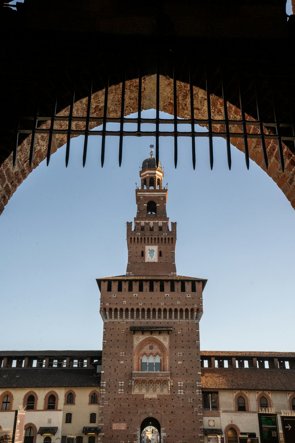 a tall tower with a clock on top of it