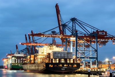 a large cargo ship docked at a dock
