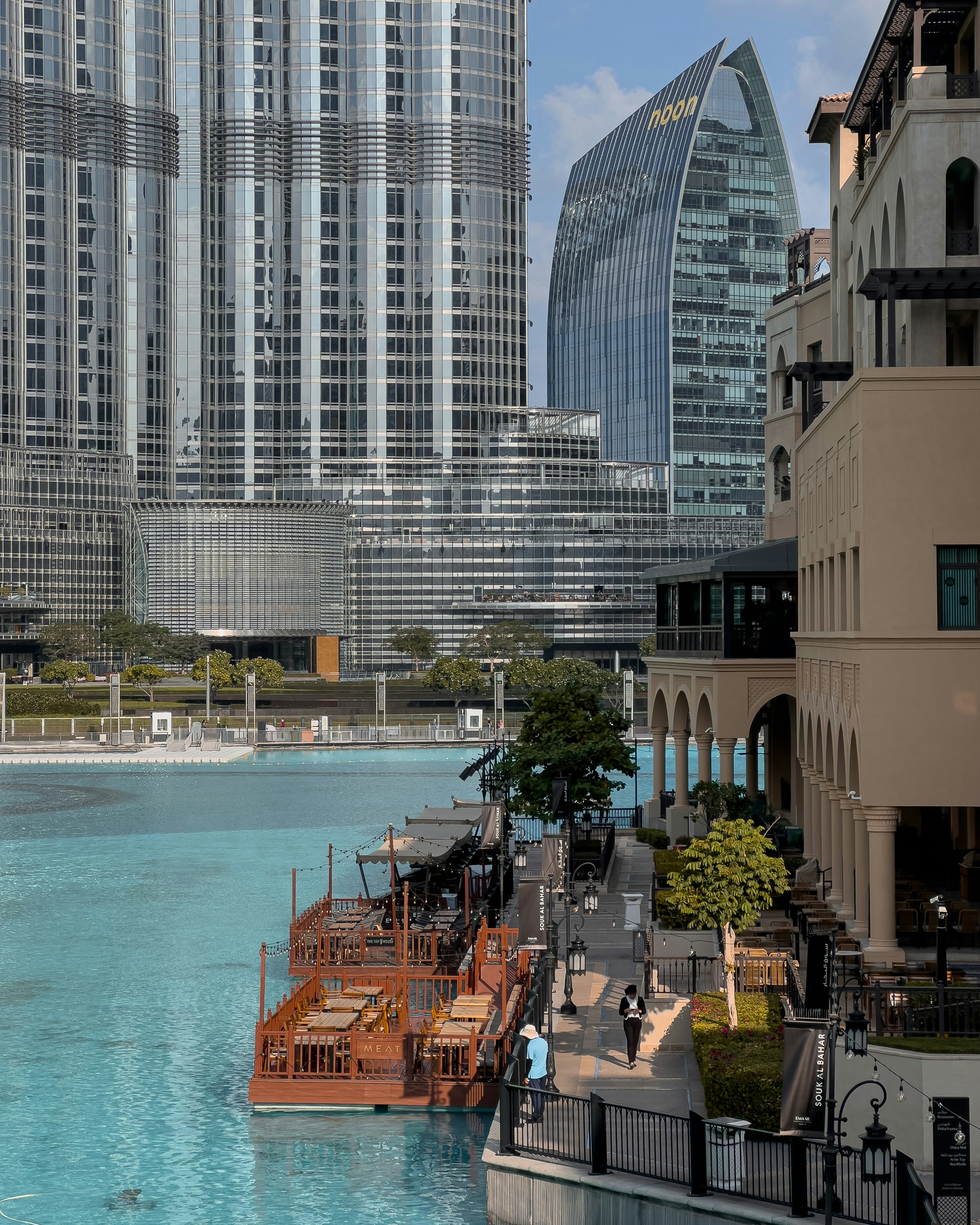 a large body of water surrounded by tall buildings