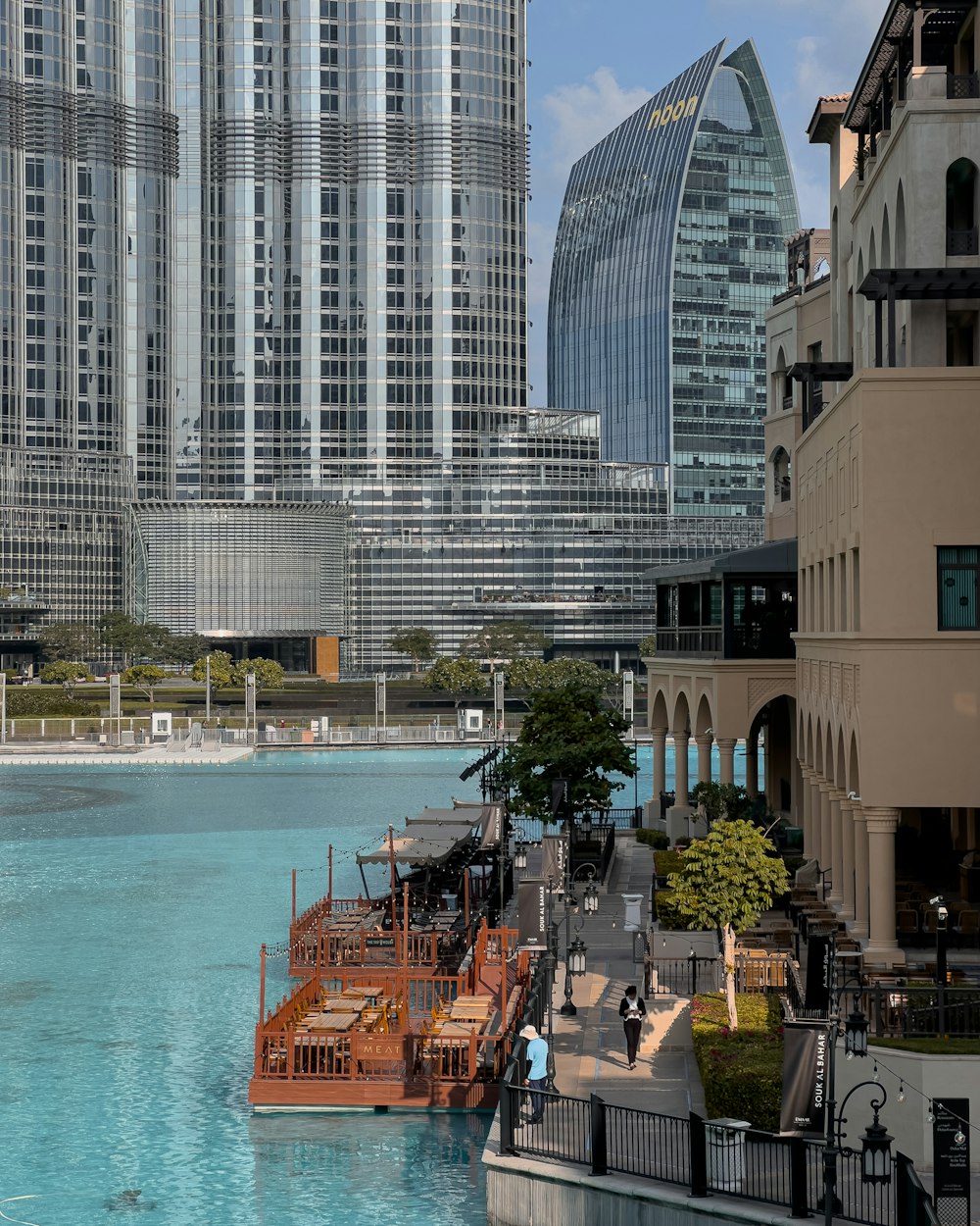 a large body of water surrounded by tall buildings