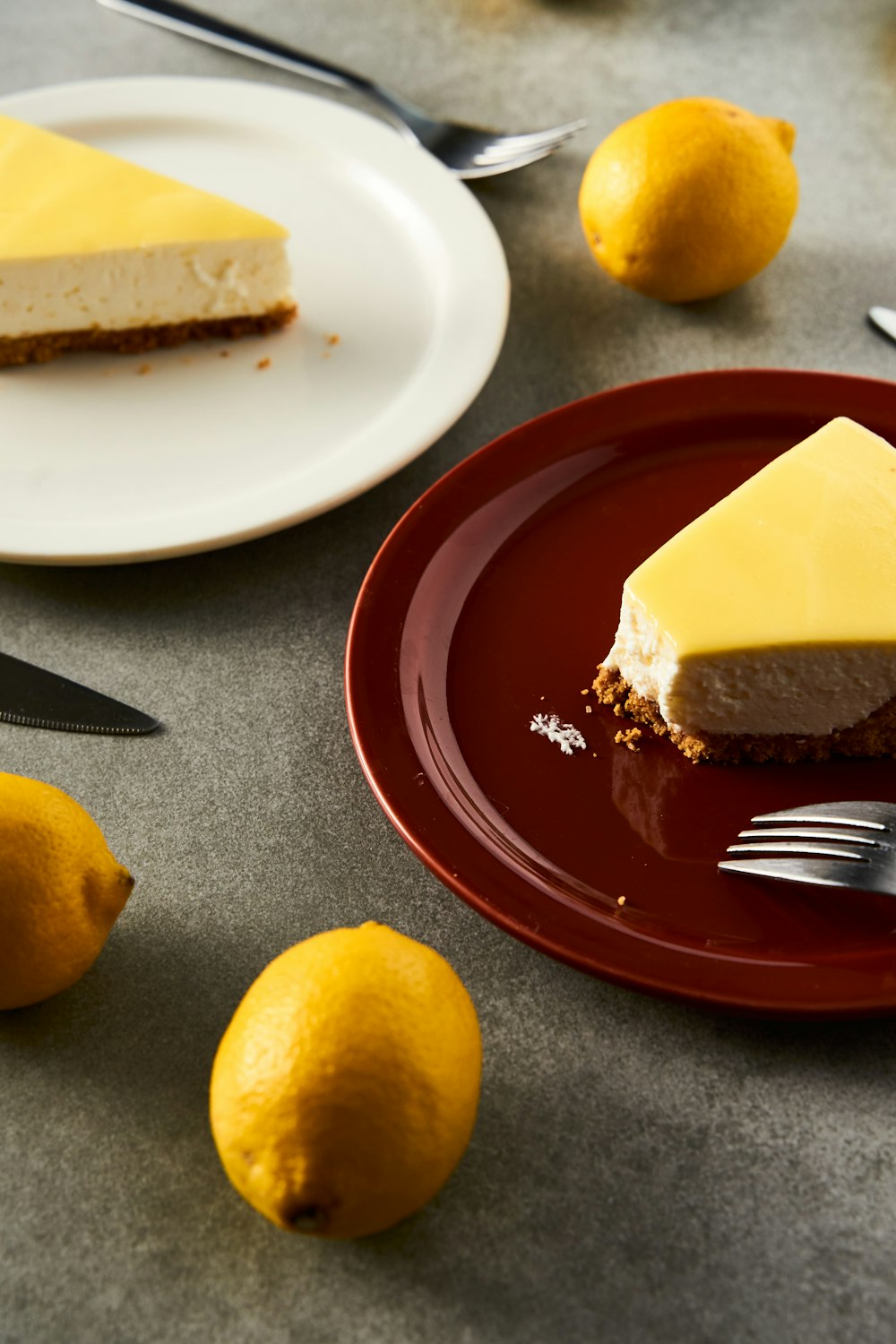 a slice of cheesecake on a plate with a fork