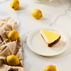 a plate with a slice of lemon cake on it