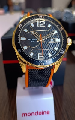 a close up of a watch on a table