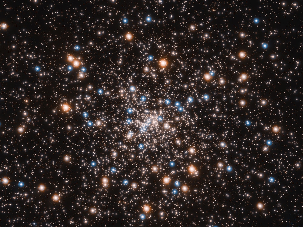 a cluster of stars in the night sky