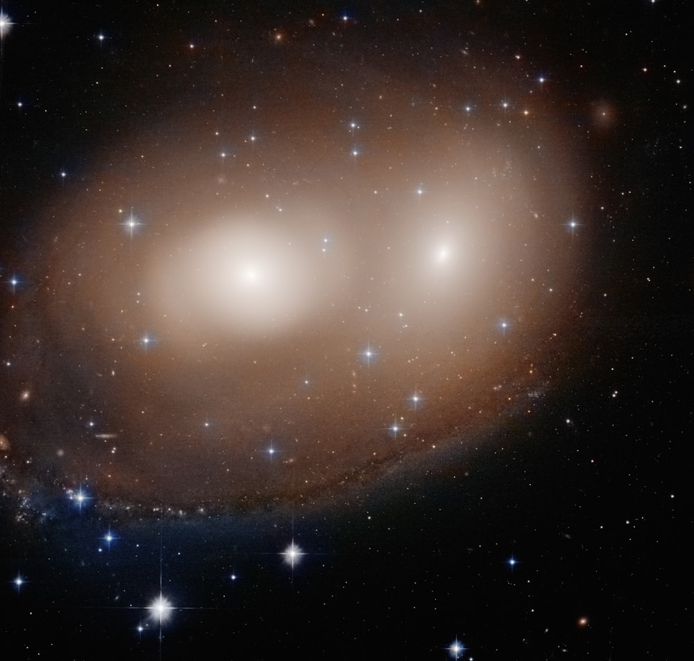 a spiral galaxy with stars in the background