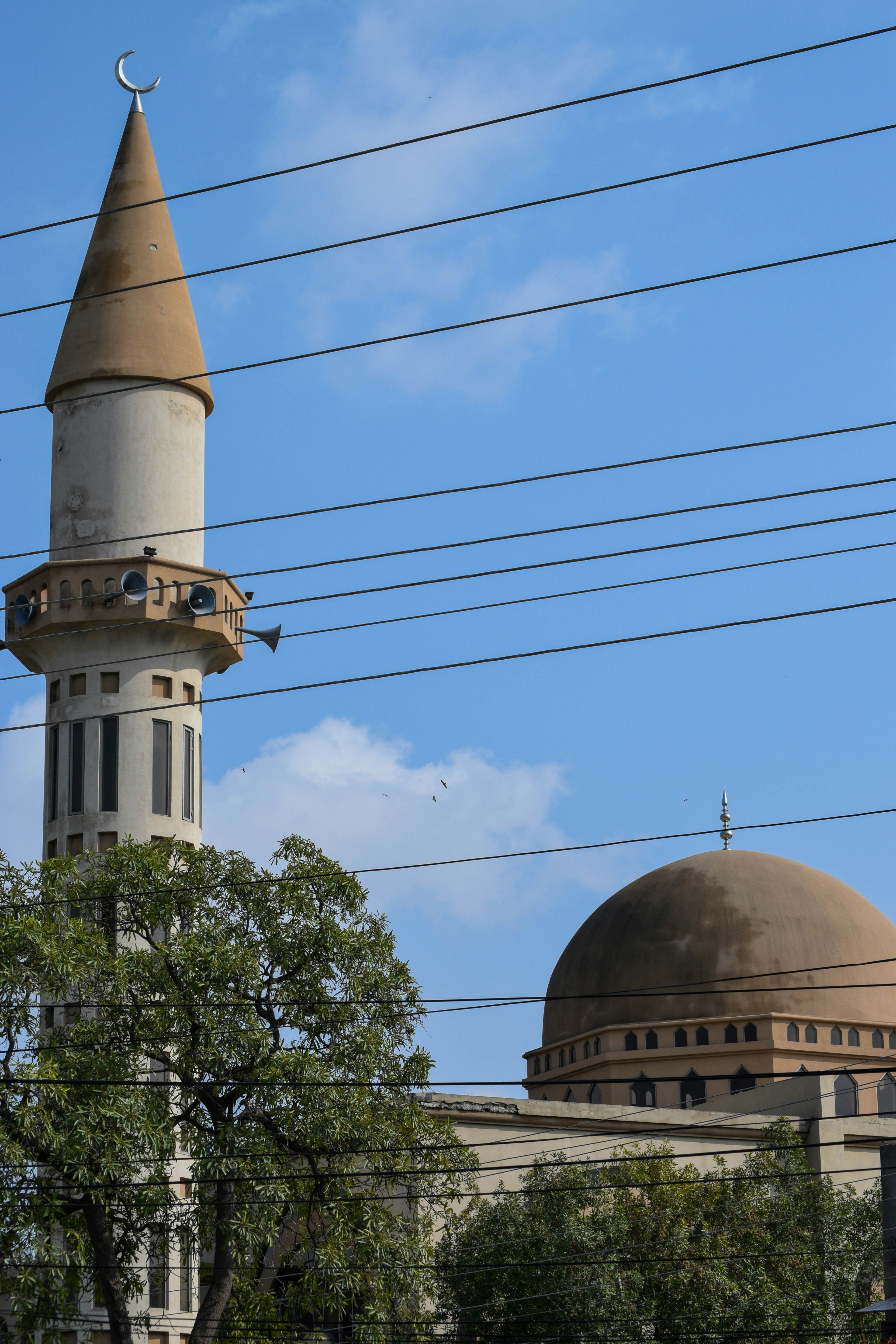 a large building with a tower and a clock on it