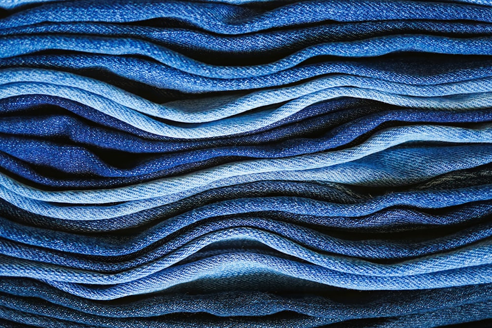 a close up of a pile of blue fabric