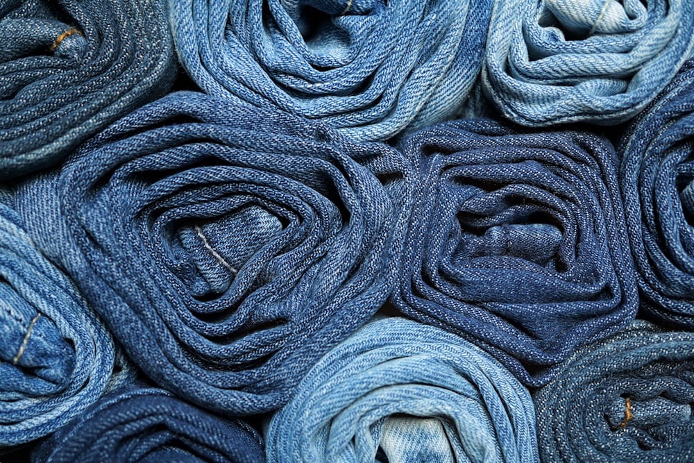 a close up of a pile of blue yarn
