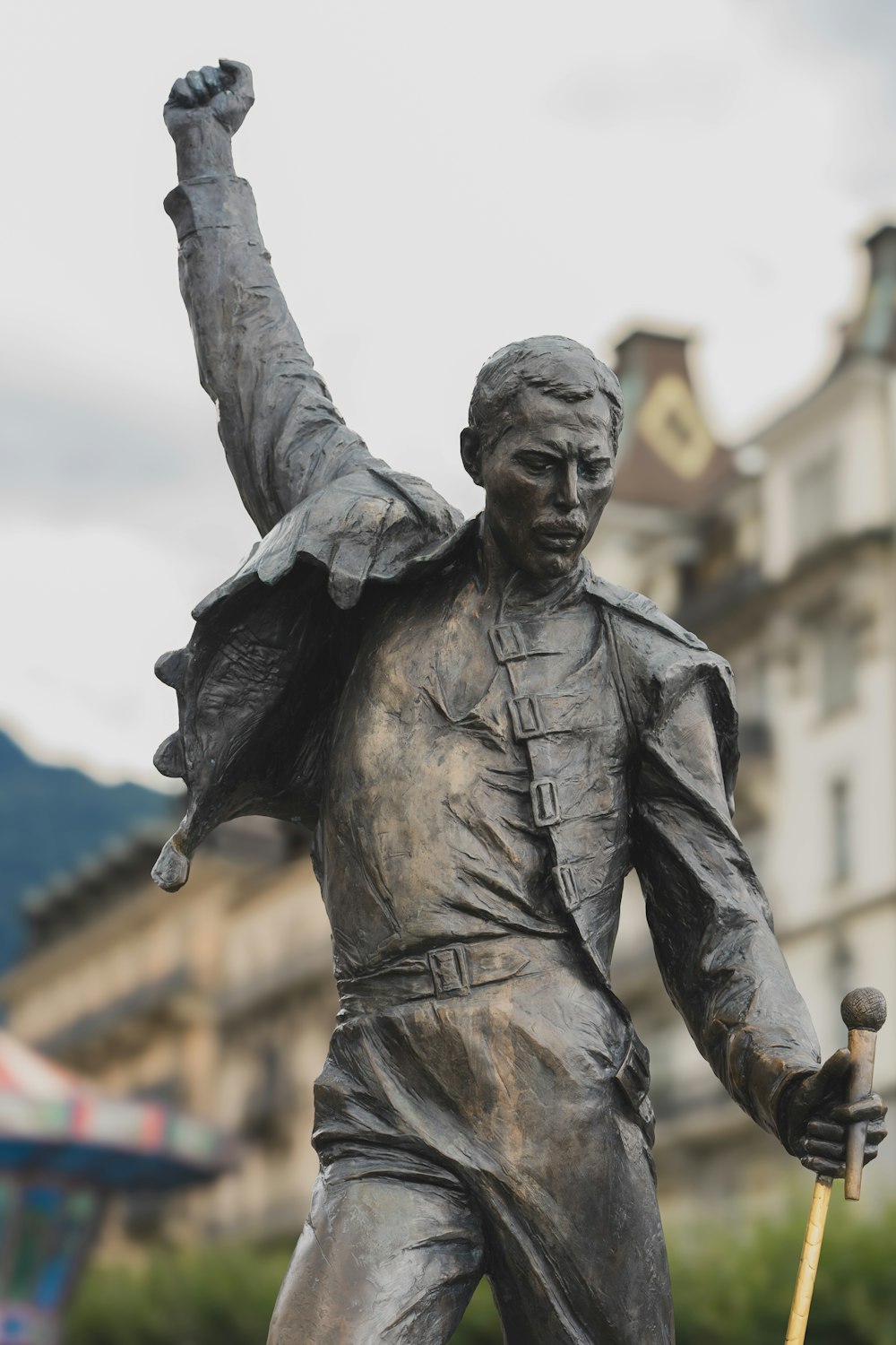 a statue of a man holding a baseball bat