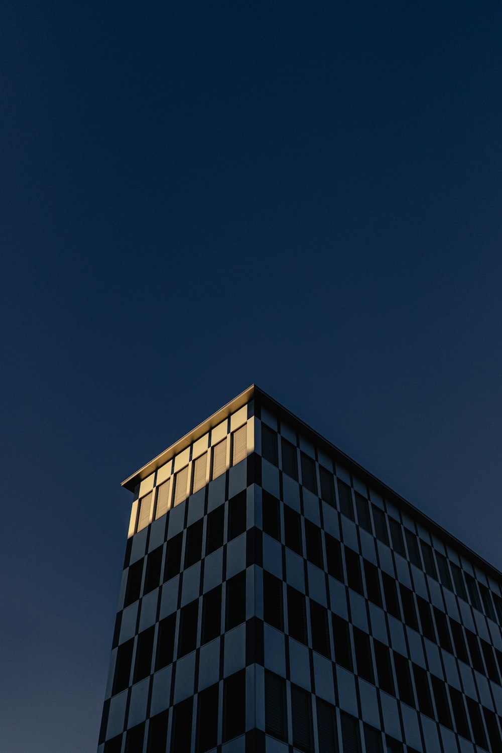 a tall building with a clock on the top of it