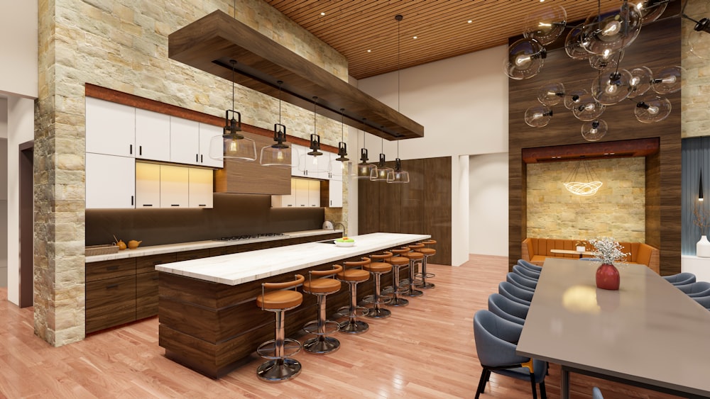 a large kitchen with a long counter and bar stools