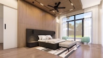 a bedroom with a bed and a ceiling fan