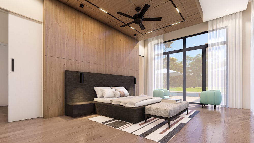 a bedroom with a bed and a ceiling fan