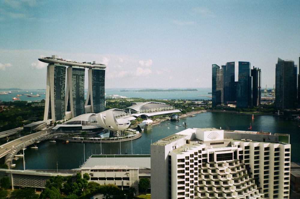 an aerial view of a city and a body of water