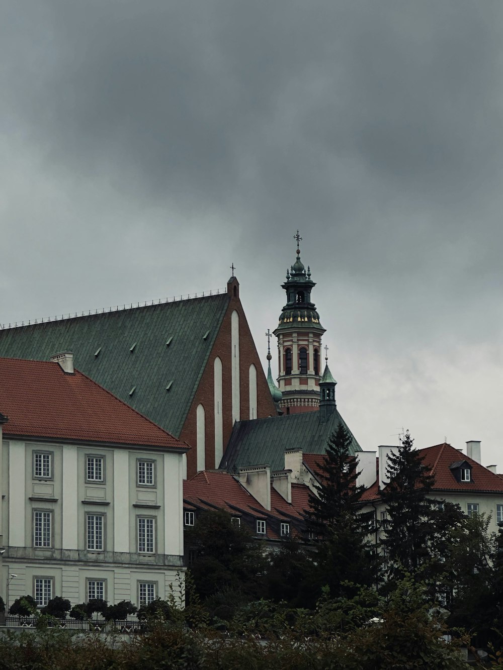 a large white building with a clock tower