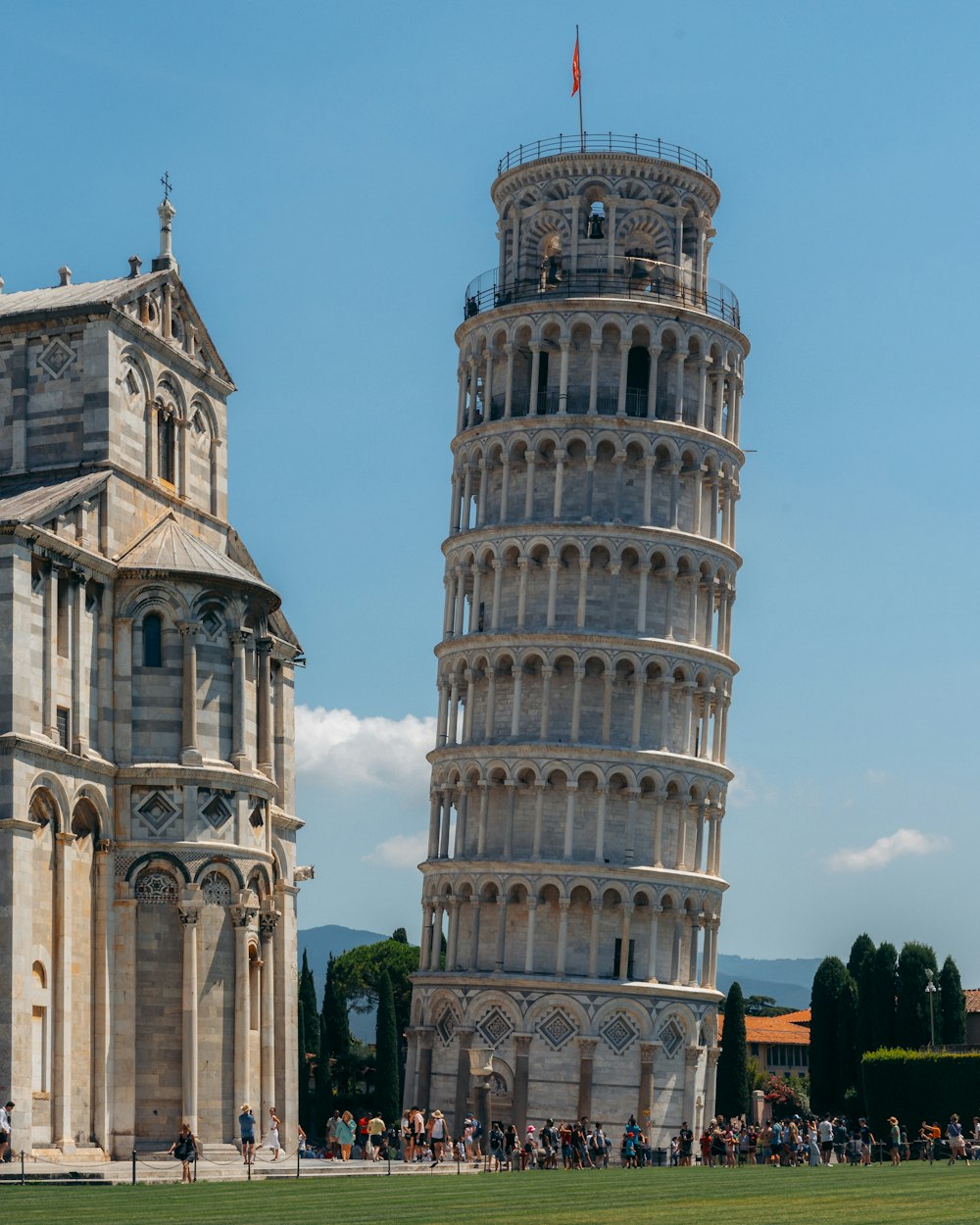 a very tall tower with a clock on it's side