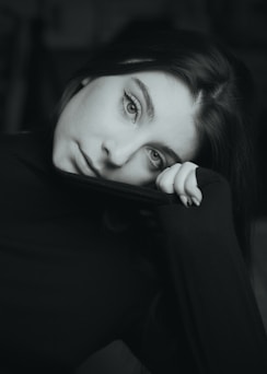 a black and white photo of a woman