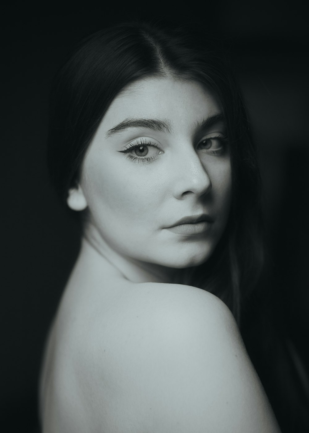 a black and white photo of a woman's face