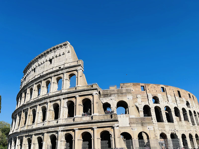 Sunlit arches of the Colosseum in Rome