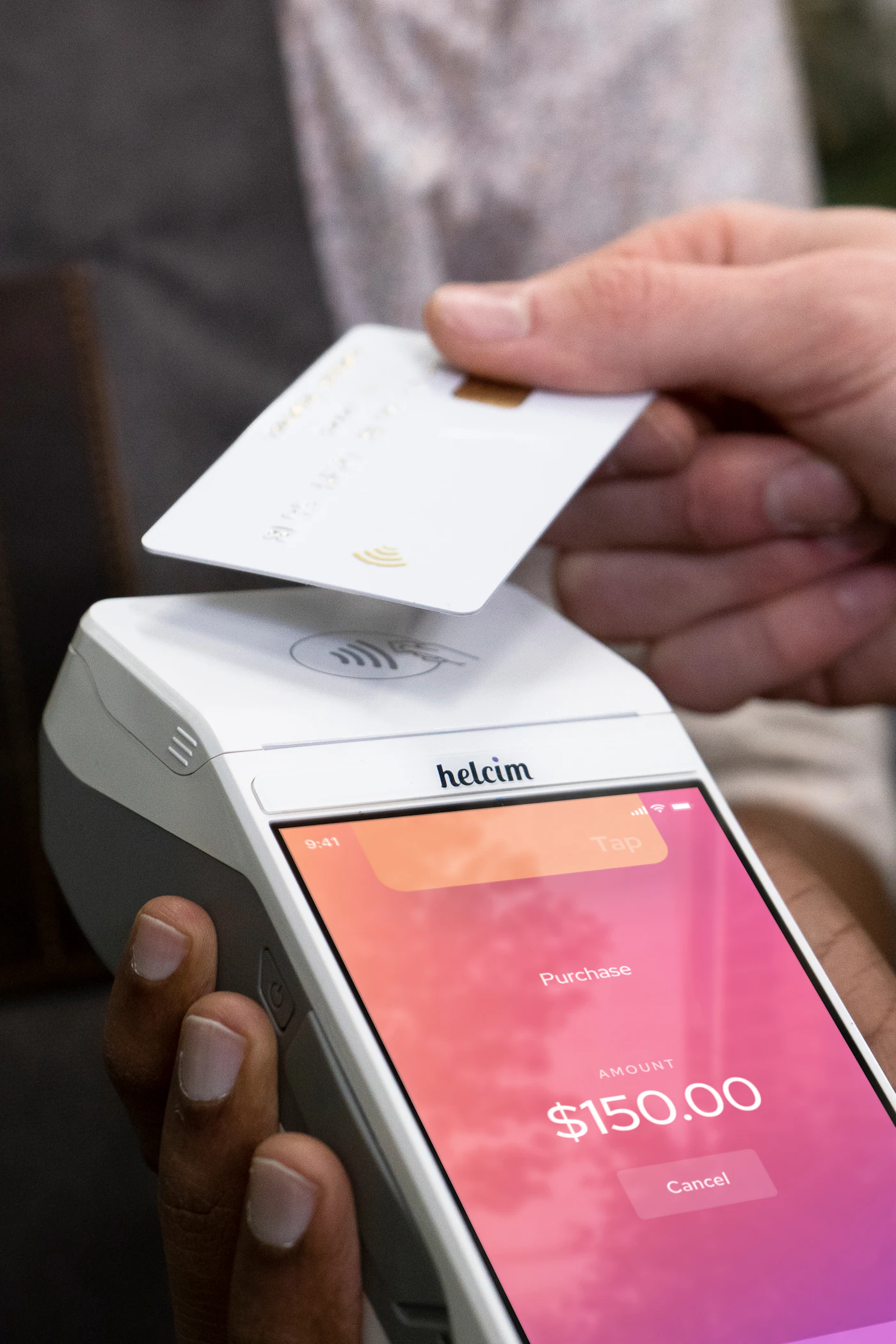 A card payment terminal on a shop counter