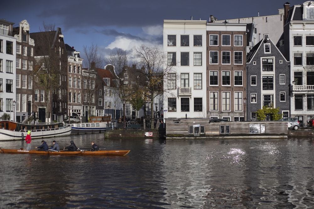 a couple of boats floating on top of a river