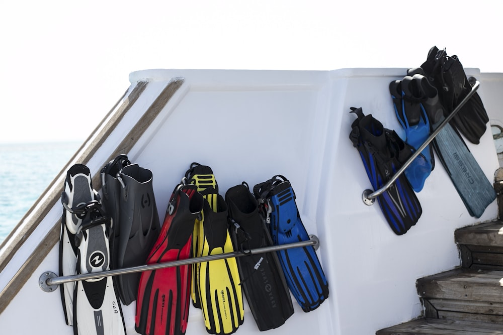 a row of diving equipment hanging on a boat