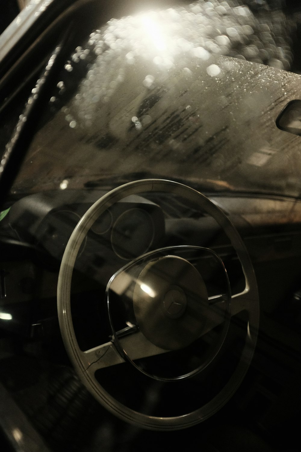 a steering wheel and dashboard of a car