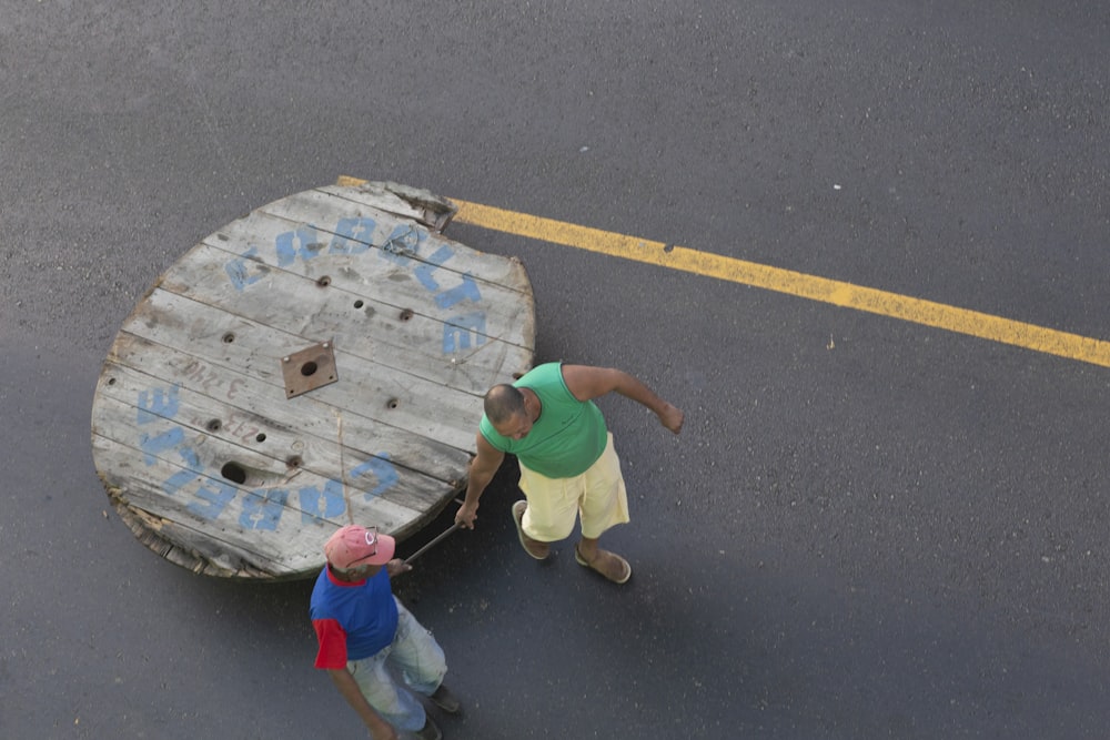 a couple of people that are on a skateboard