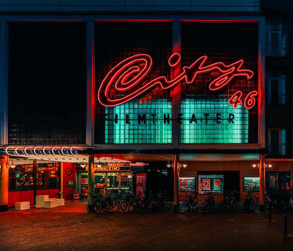 a building that has a neon sign on it