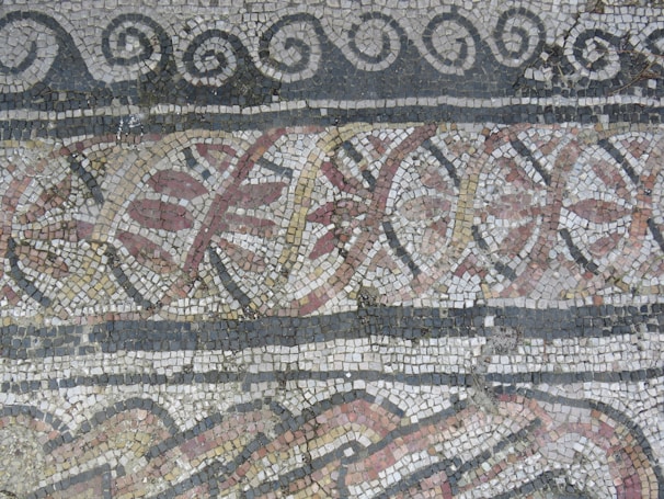 a close up of a mosaic on a wall