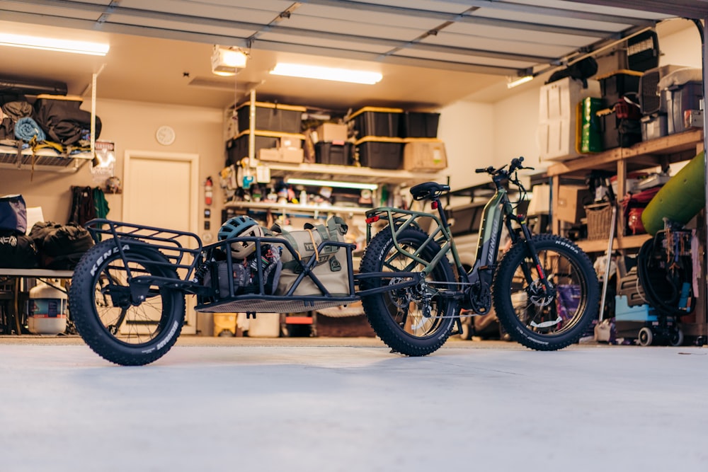 a motorcycle is parked in a garage next to a motorcycle