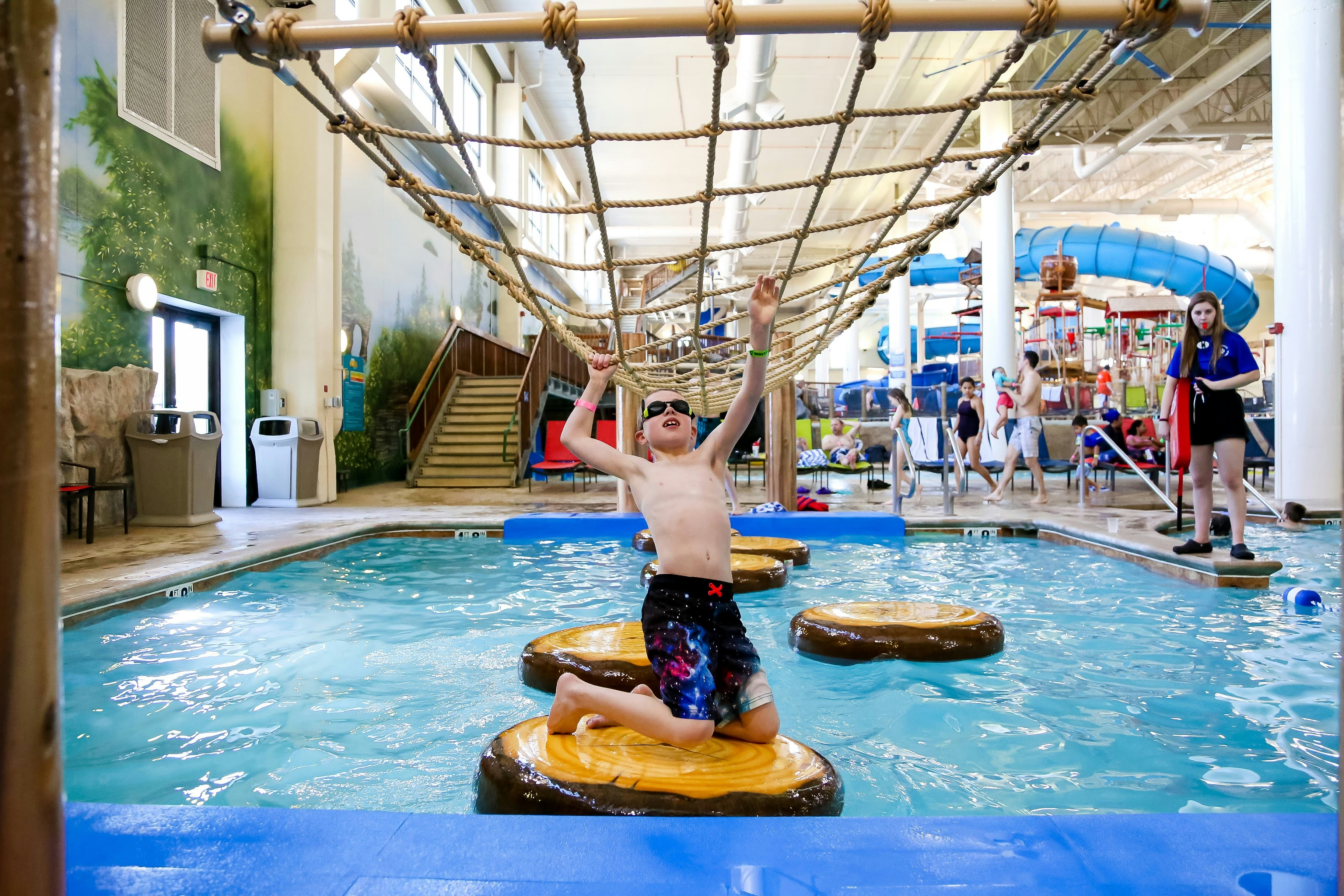 Young boy playing in water park