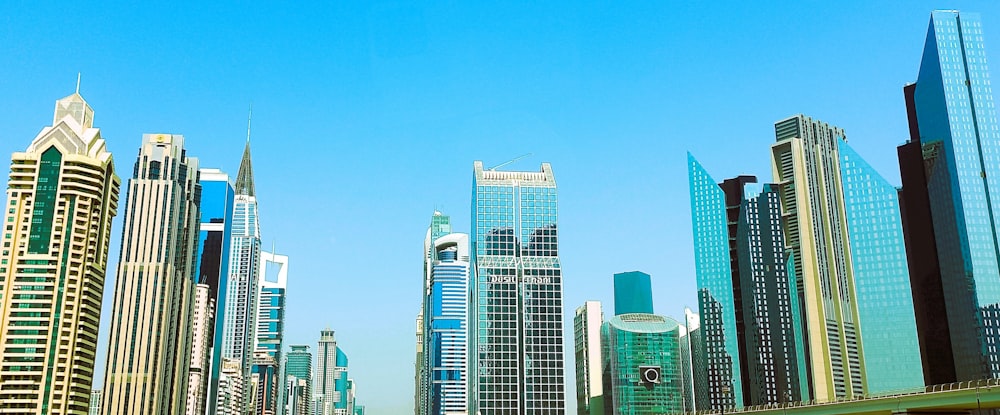 a group of tall buildings in a city