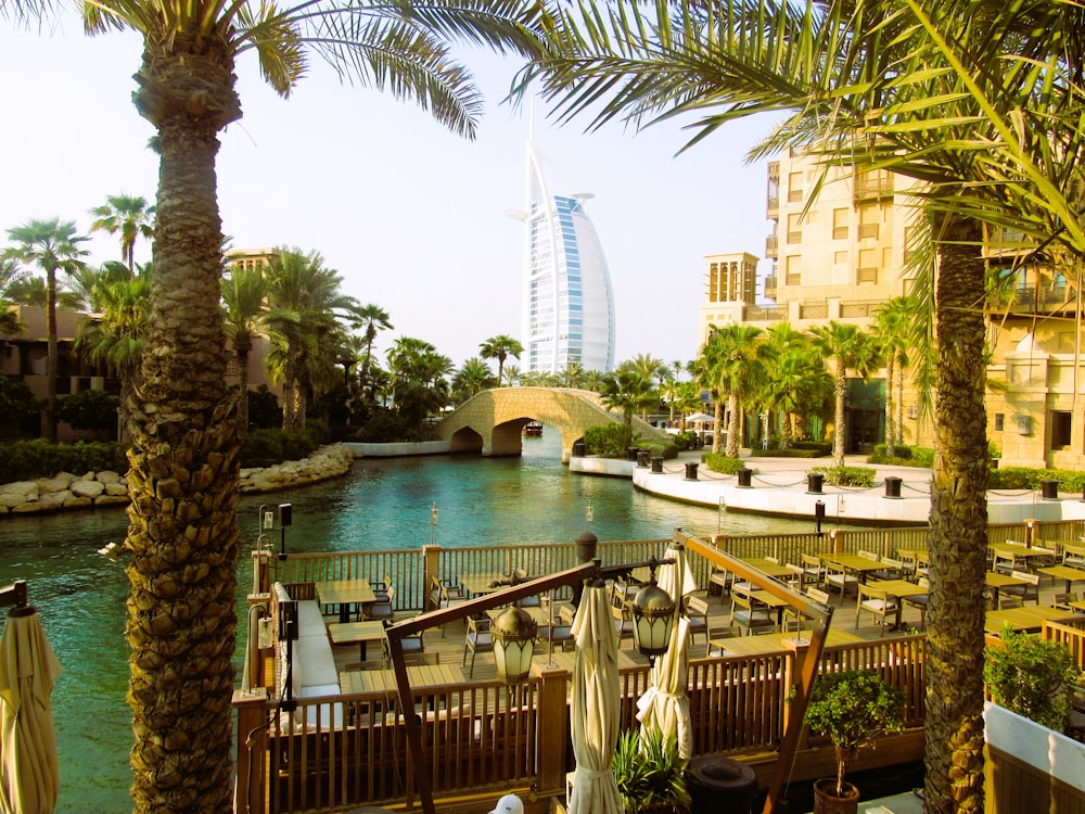 a river running through a city next to tall buildings