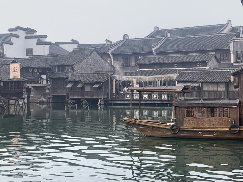 a boat floating on top of a body of water