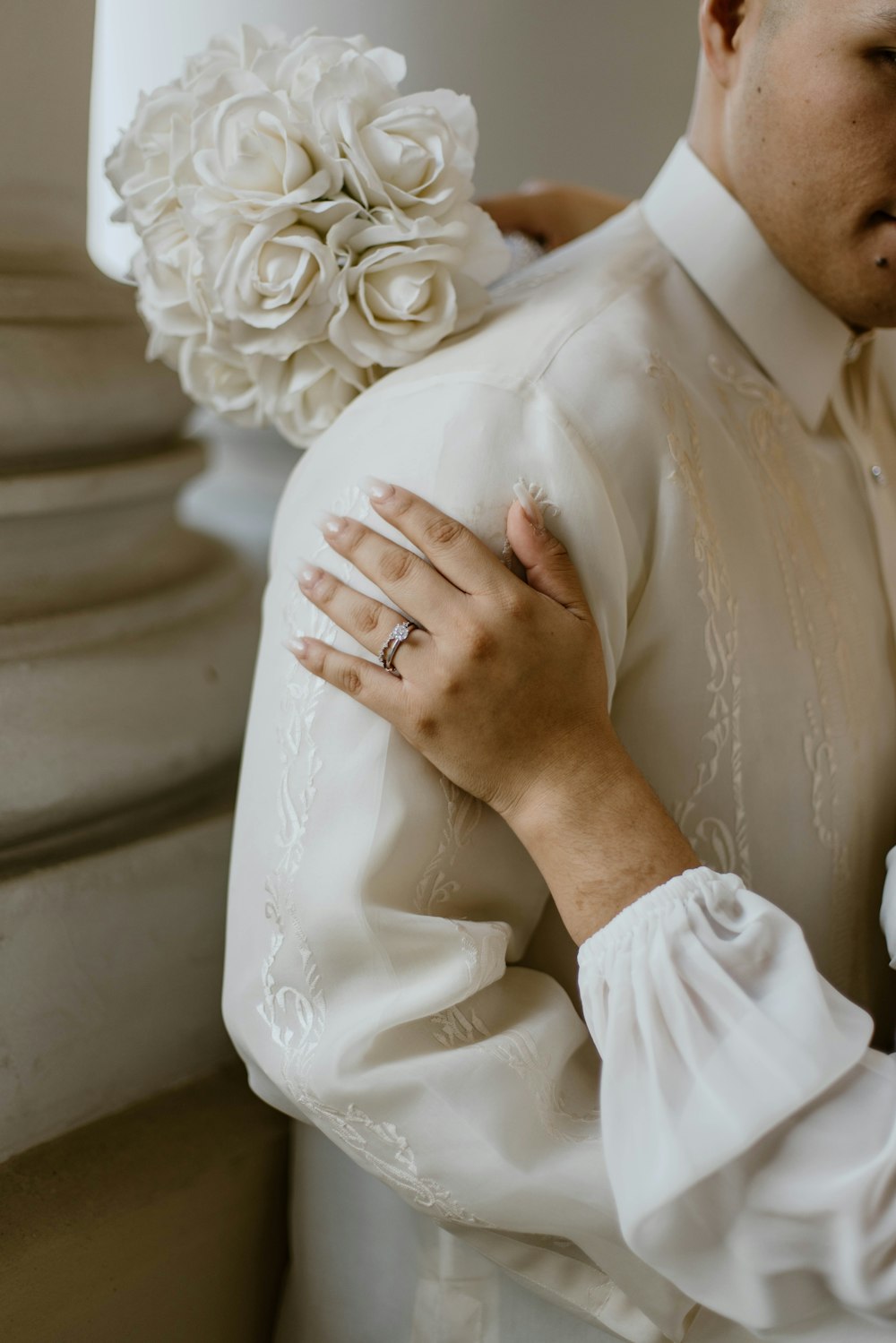 a man and a woman hugging each other