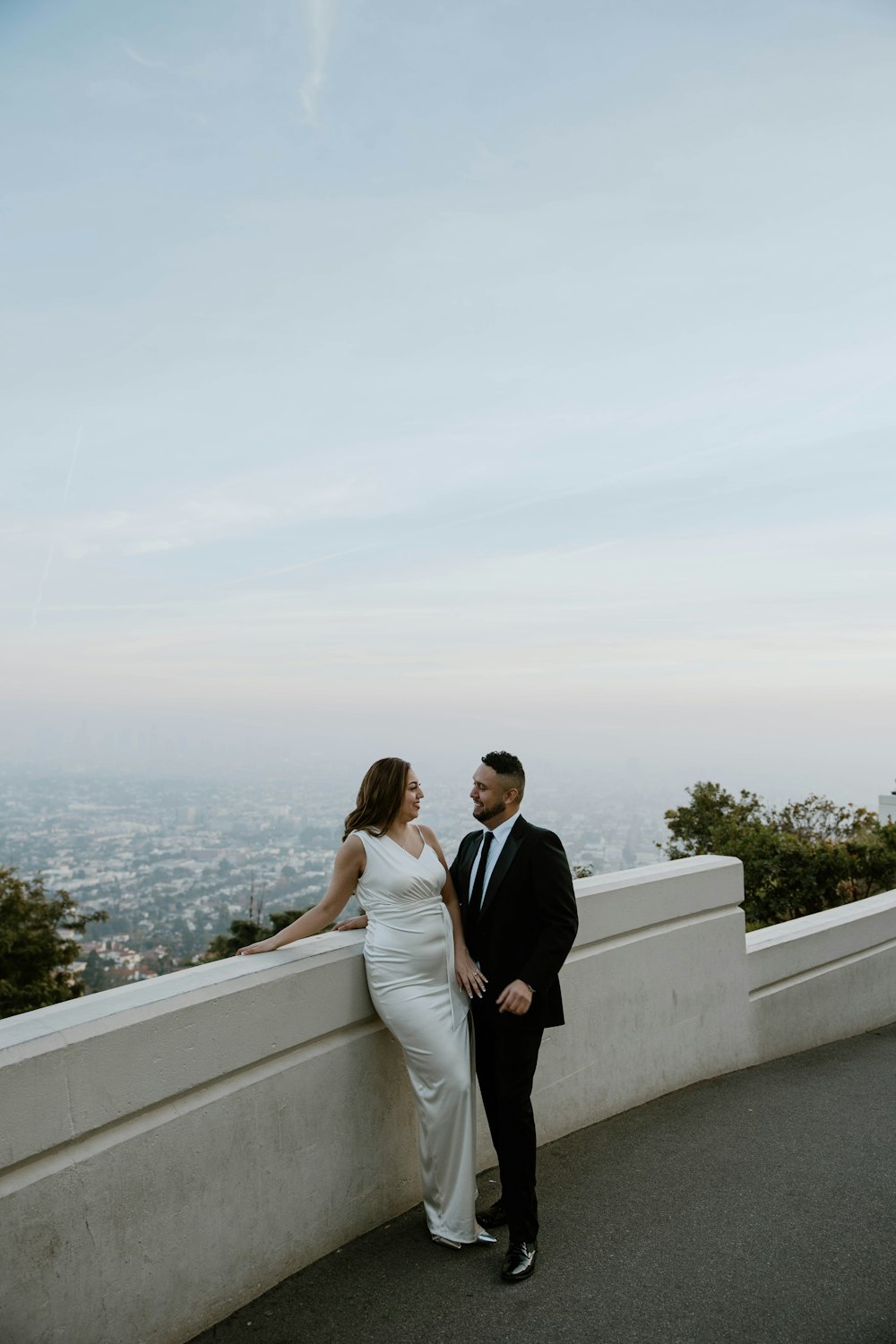 a man and a woman standing next to each other