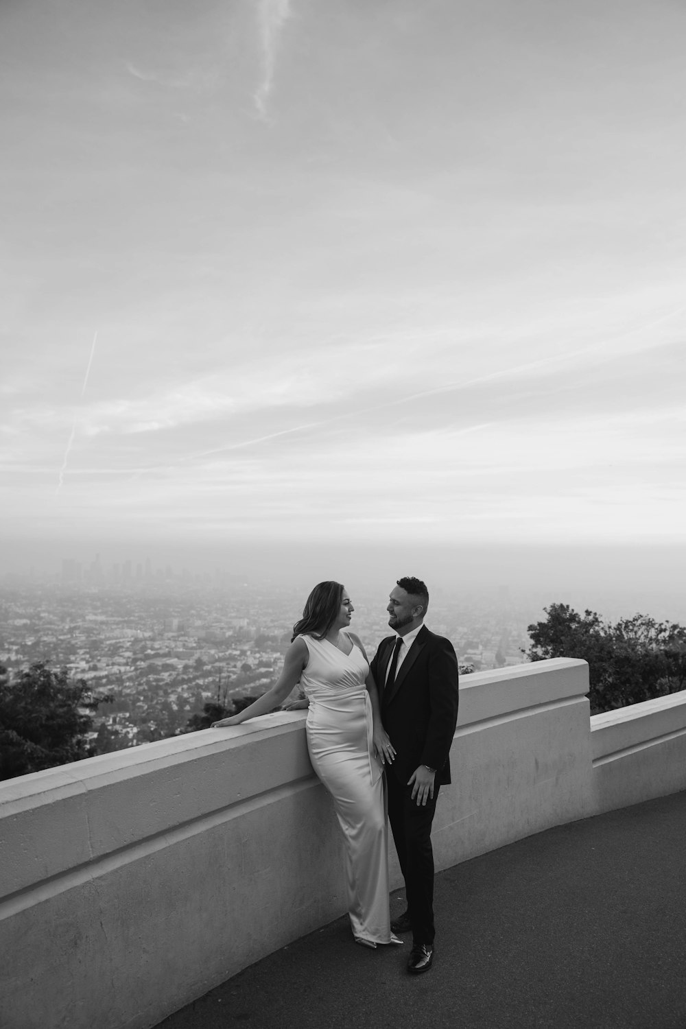 a man and a woman standing next to each other