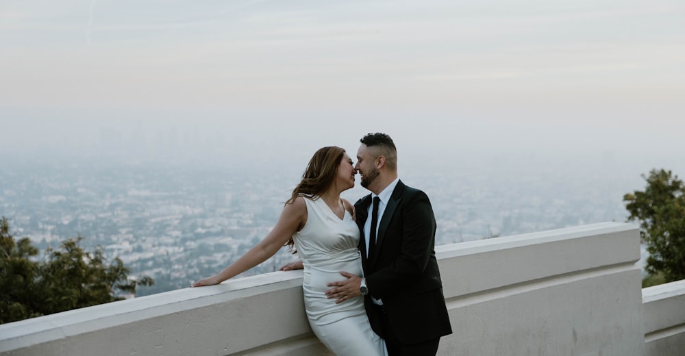 a man and a woman standing next to each other