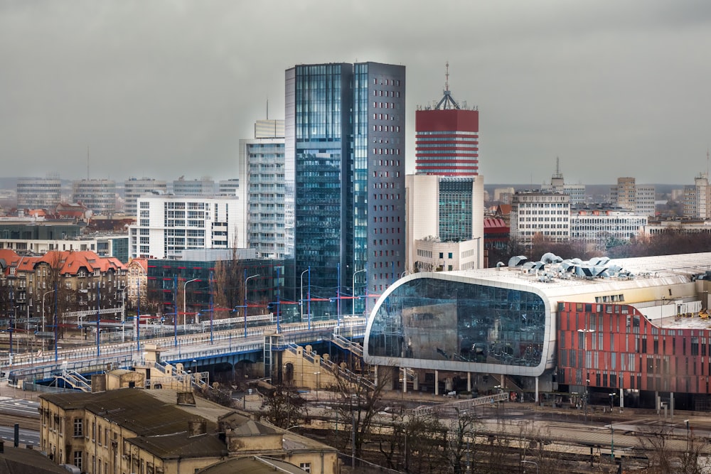 a view of a city with tall buildings and a bridge