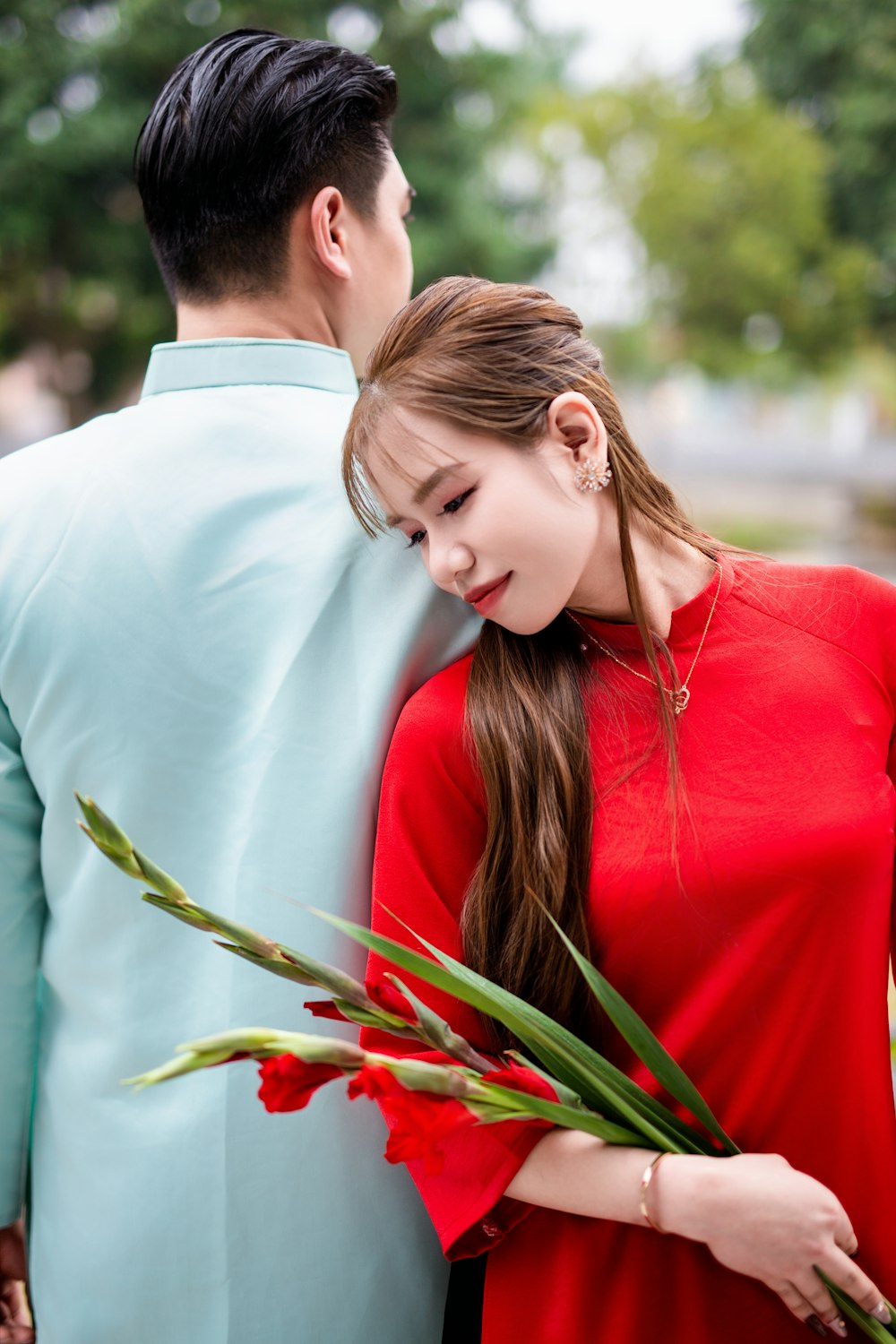 a man and a woman standing next to each other