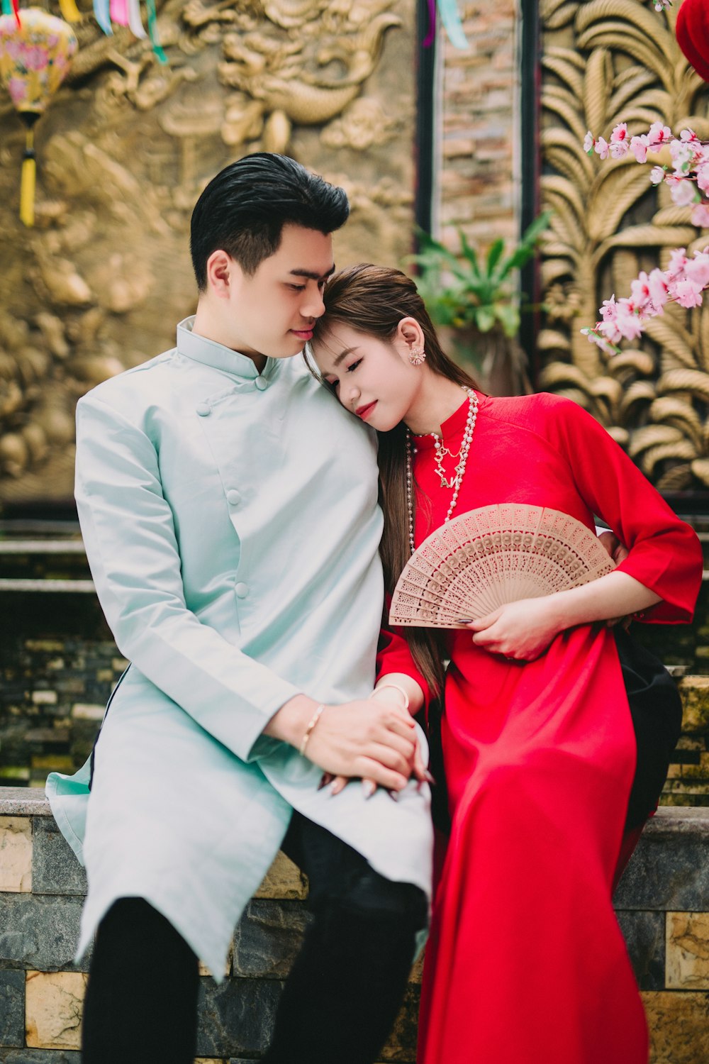 a man and a woman are sitting on a bench