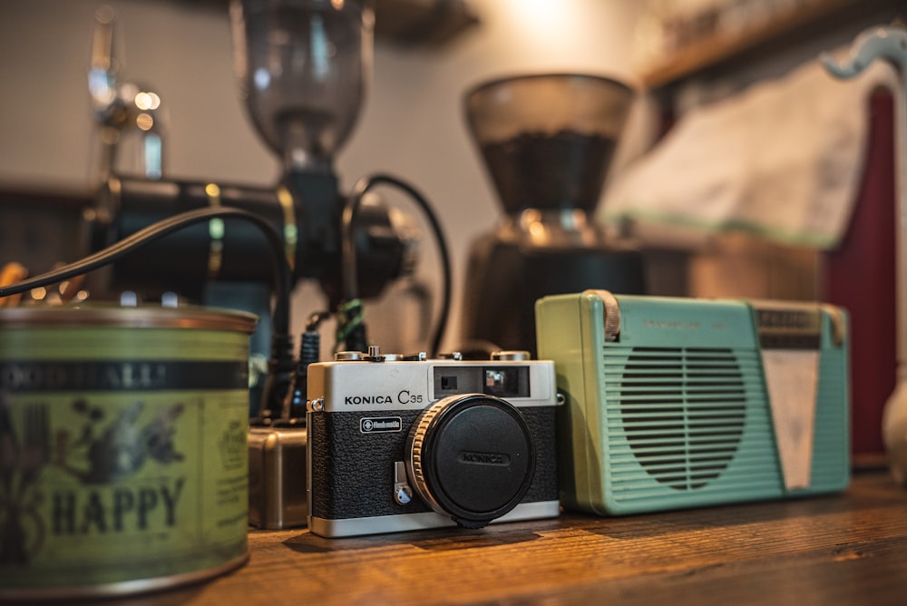 a camera and some other items on a table