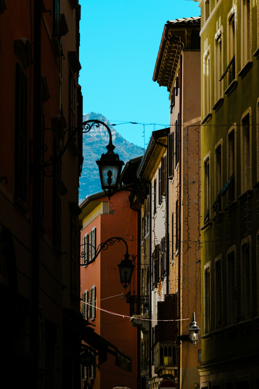 a city street with buildings and a street light