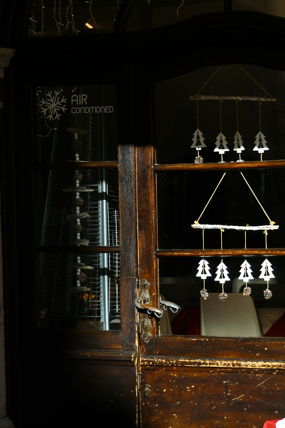 a display of christmas decorations in a store window