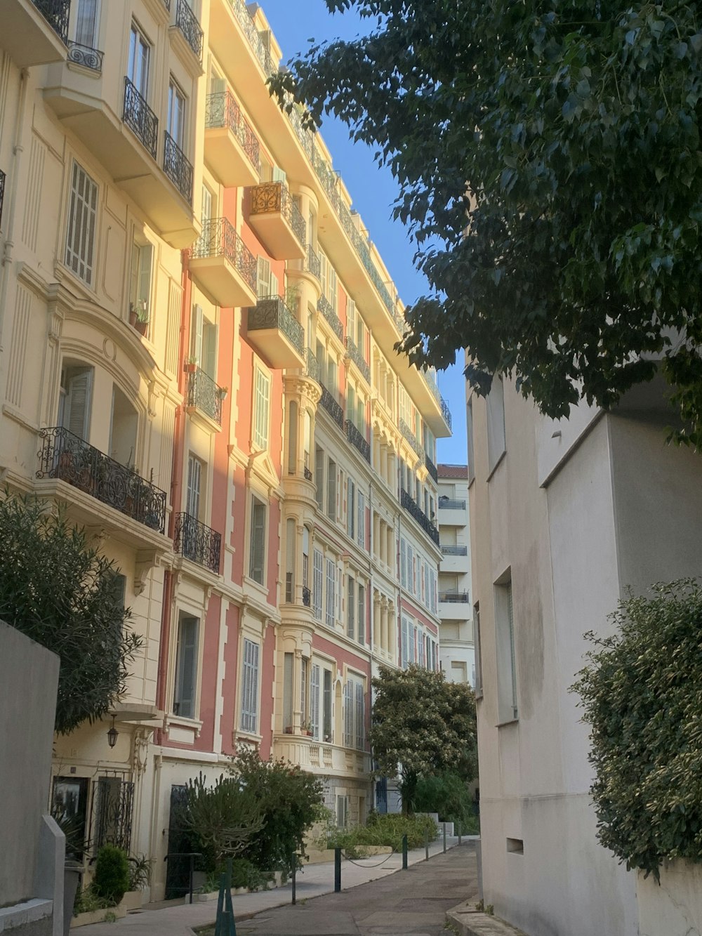 a row of multi - story buildings with balconies and balconies on