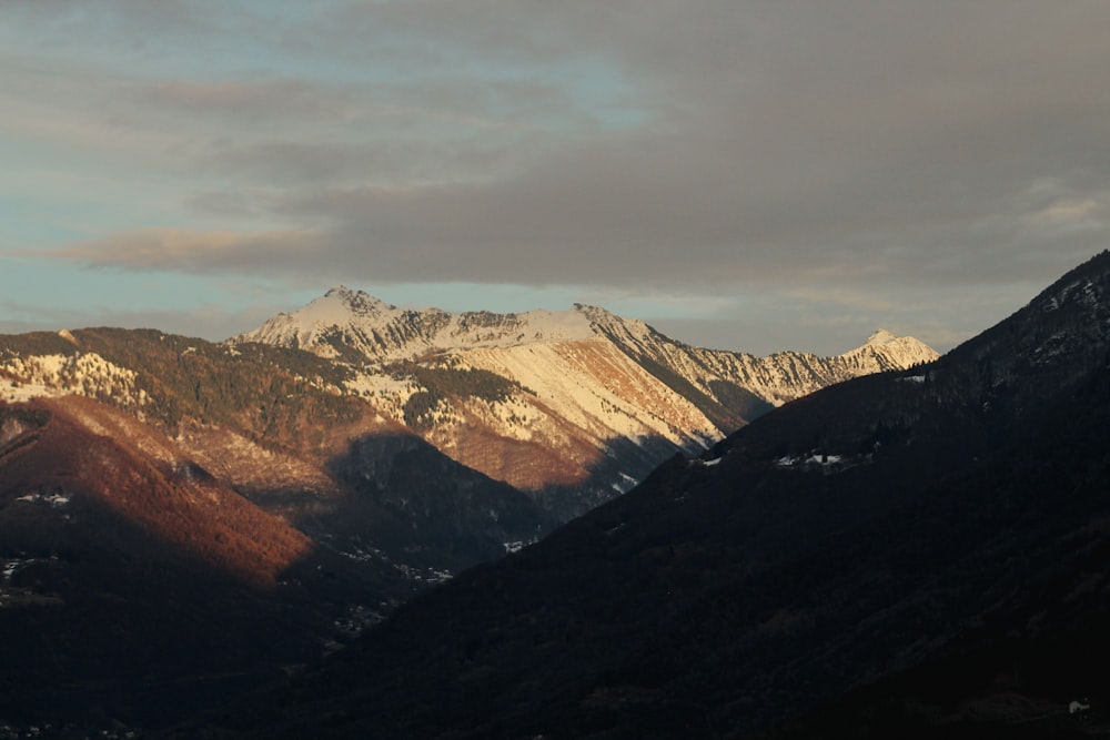 a view of a mountain range at sunset