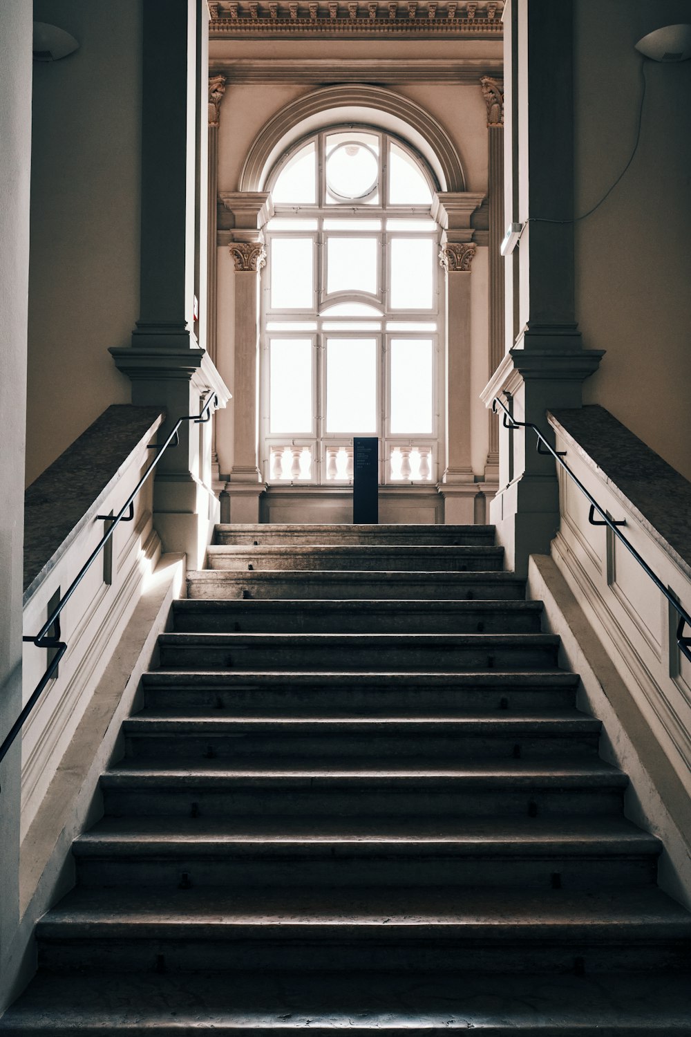 a set of stairs leading up to a window