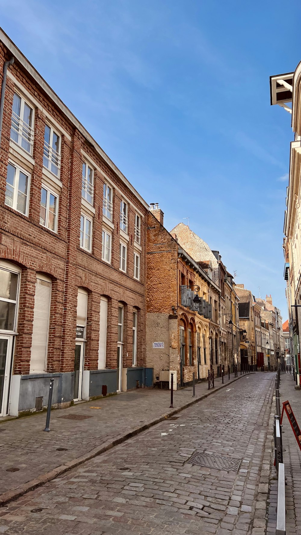 a street with a few buildings on both sides of it