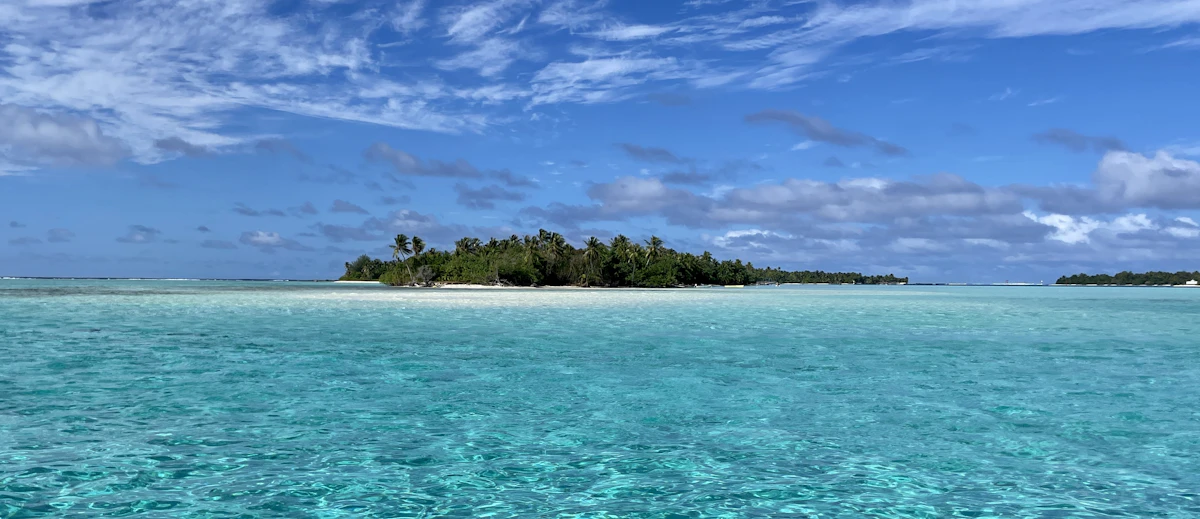 Tropical beach with clear water in Tahiti